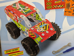 Hot Wheels Monster Trucks Build & Customize Metal Construction Kit, 2 Truck Set (Tiger Shark & Demo Derby), DIY Assembly Toy, Ages 6+