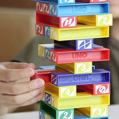 Mattel Games UNO StackoGame for Kids and Family with 45 Colored Stacking Blocks, Loading Tray and Instructions, Makes a Great Gift for 7 Year Olds and Up (43535)